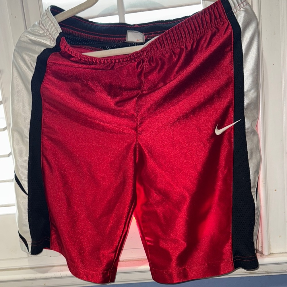 Nike Red, black and white Sports Shorts for men. Size medium but run small